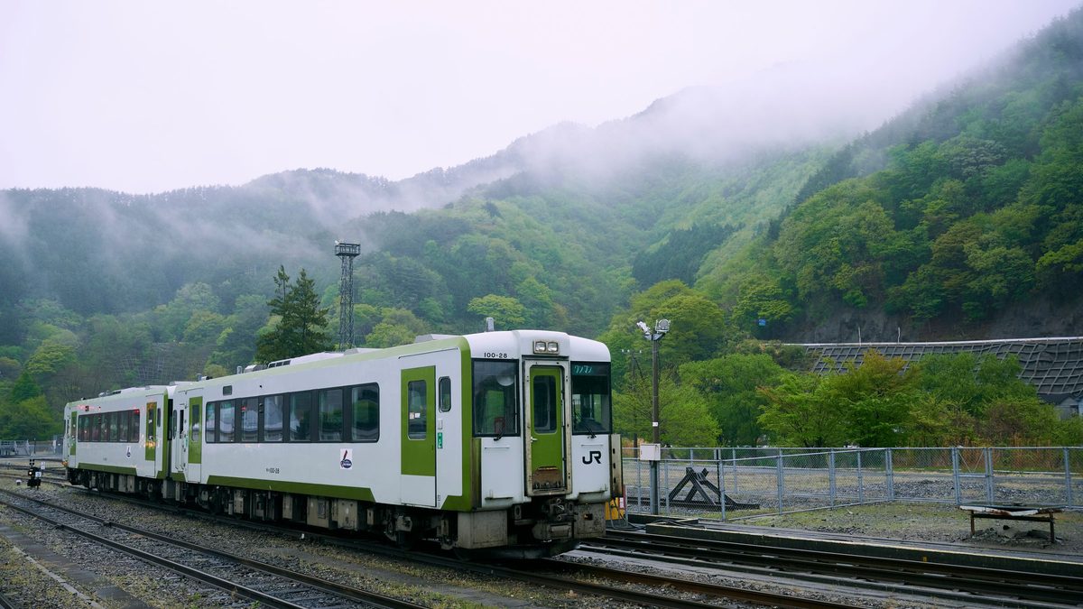 A local train crossing the countryside in northern Japan