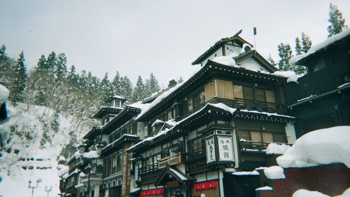 A traditional ryokan street in a Japanese hot-spring town